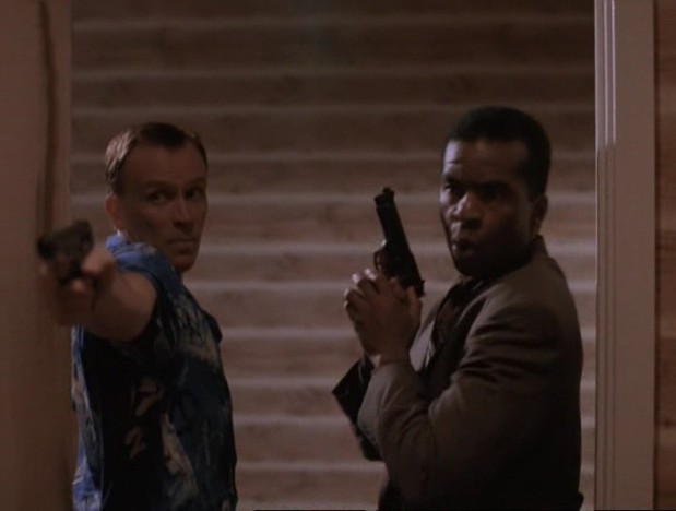 Peter Weller and Tia Carrere in 'Top of the World' (1997)
